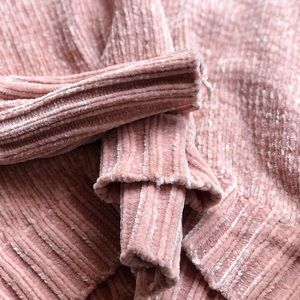 Pink turtleneck sweater